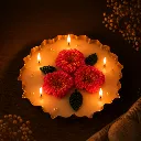 Warm candlelight with floral accents.webp