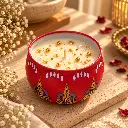 Ornate Red Candle in Golden Light.webp