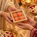 Diwali Gift Exchange with Golden Ladoo Box.webp